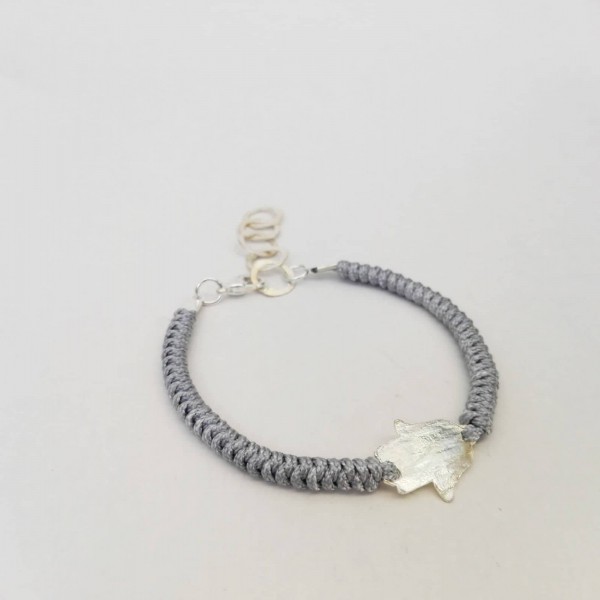 Bracelet avec fetiche en argent